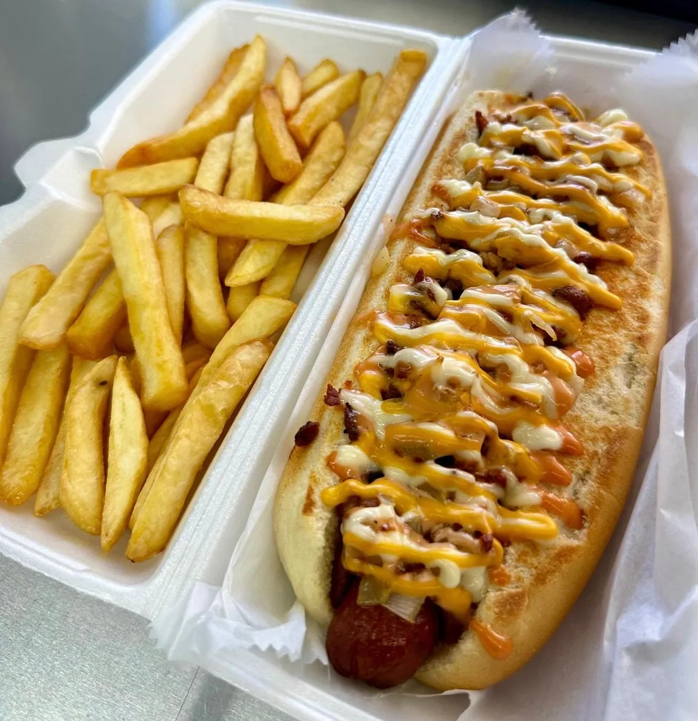 Delicious hot dog with fries from D'Reyes Delicias food truck, Monroe.